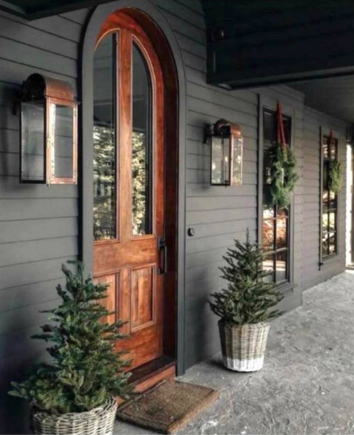 Professional door installation and repair service in Sacramento featuring wood entry door exterior